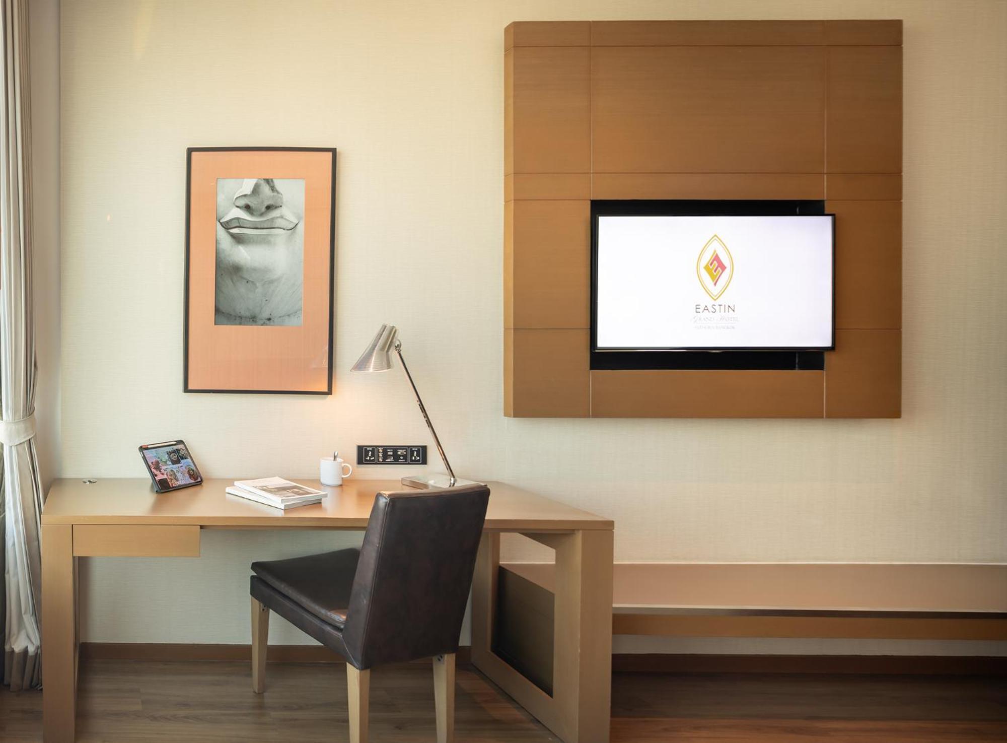 Eastin Grand Hotel Sathorn Bangkok Room photo A television in a hotel room